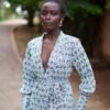 Charly wrap top with long cuffed bishop sleeves, made from hand block printed cotton. Versatile design with a detachable belt, tied around the front. 100% cotton, handmade in Kenya.